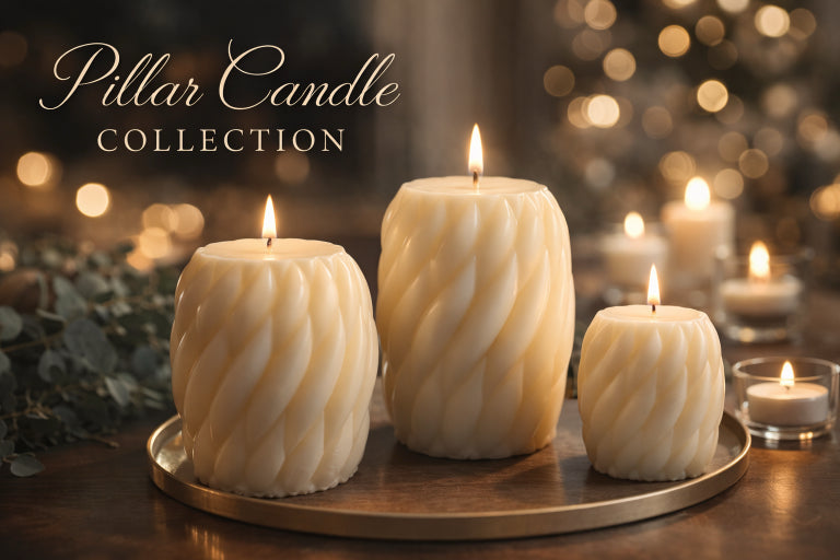 Elegant ivory pillar candles from the Flame Elegance Pillar Candle Collection styled on a gold tray with warm ambient lighting for luxury home decor.
