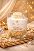Golden Empress luxury artisan candle with jasmine sea flower scent, featuring a clear glass vessel with gel wax base, ivory center layer, and ivory peony floral top dusted with gold mica for an extra shimmer. 