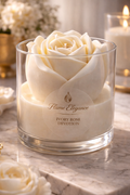 Ivory Rose Devotion luxury artisan candle scented in rich amber noir, featuring an ivory rose-shaped wax design in a clear vessel for an elegant, romantic aesthetic. 