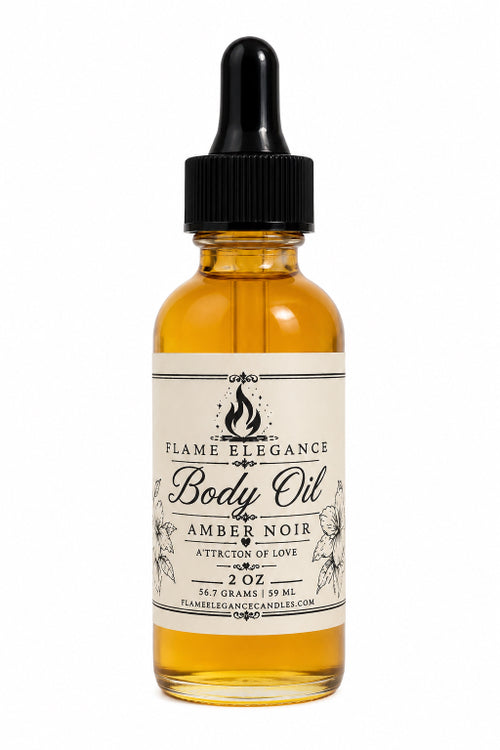 A 2 oz amber glass dropper bottle of Flame Elegance Amber Noir Body Oil in the Amber Noir scent, featuring a cream-colored label with black text and a black dropper cap, set against a plain white background.