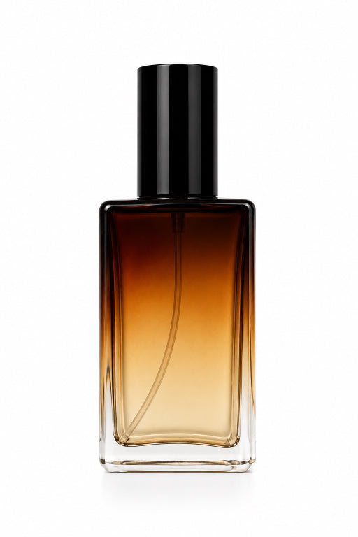 A rectangular glass perfume bottle with a black cylindrical cap, featuring a warm amber-to-clear gradient liquid, set against a plain white background. Amber Noir fine perfume spray by Flame Elegance.