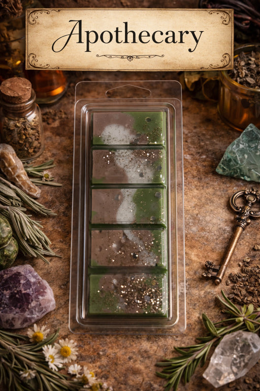 Apothecary hand poured soy wax melt bar in clamshell packaging with herbs surrounding the wax melt bar. 