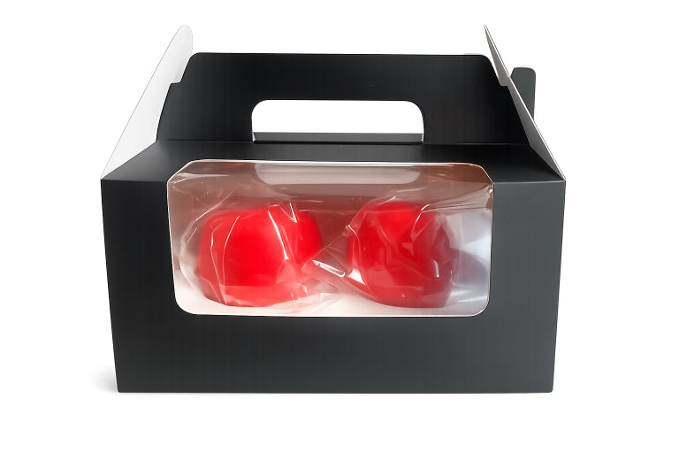 two apple bliss candles with cotton wicks red in color packaged in an elegant black box with white background by flame elegance.