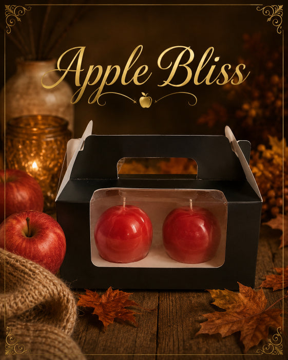 two scented soy wax apple bliss candles in black box with fall decor and apples in the background by Flame Elegance