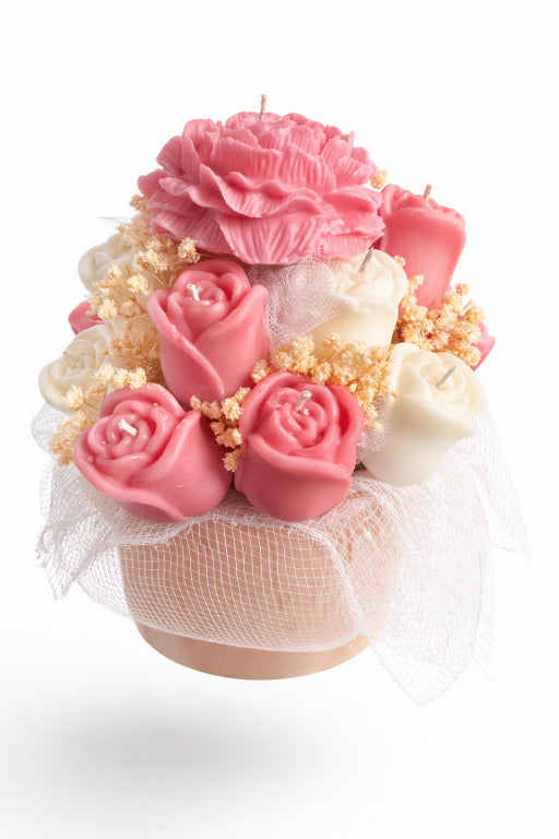 Pink Peony Candle and Pink and Ivory Rose candles in a pink keepsake box adorned with dried baby's breath and mesh to make a beautiful candle bouquet with white background. 