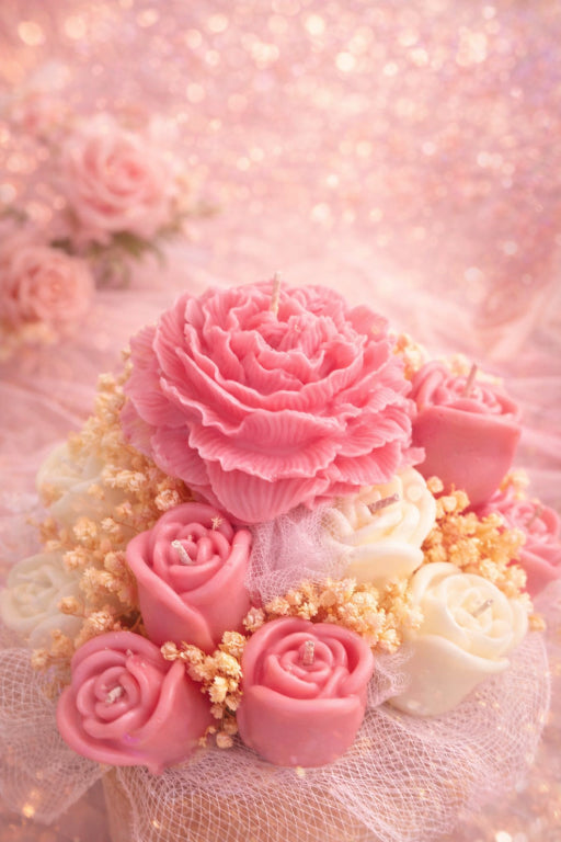Bouquet of pink and white rose candles with a soft pink background by Flame Elegance. 