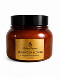 Jar of Jasmine Sea Flower whipped body butter with a gold label on a white background in 8 oz  amber colored jar. 