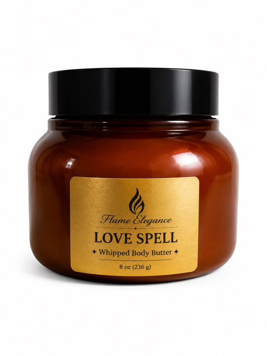 Amber jar of luxe 'Love Spell' whipped body butter with a gold label on a white background by Flame Elegance