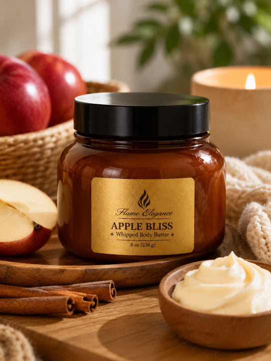 Jar of 'Apple Bliss' whipped body butter with apples, cinnamon, and a candle in the background by Flame Elegance