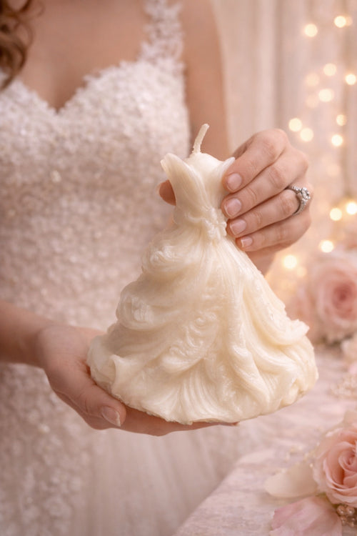 Bride holding bridal empress sculpted unscented candle by Flame Elegance. Perfect for weddings or bridal gifts. 
