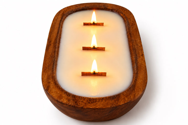3 wood wick lit cream soy candle. Cafe spice is the scent housed in a wood dough bowl with all white background. 