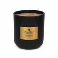Black 10 oz glass elegant vessel with brown soy wax  candle scented with Cafe Spice coffee scent by Flame Elegance  with a gold label on a white background
