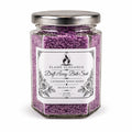 Jar of purple lavender moon bath salts by flame elegance with white background