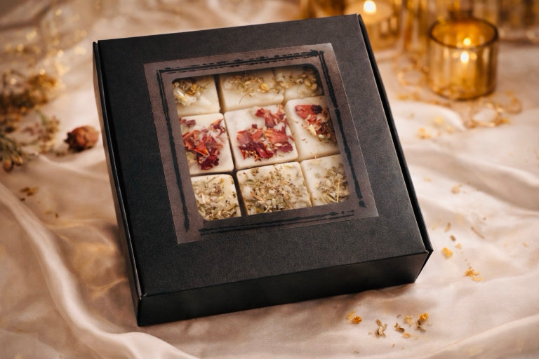 Luxury herbal wax melts gift box with botanical toppings including rose, lavender, and chamomile herbs