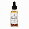 A 2 oz glass dropper bottle of Flame Elegance Body Oil with Love Spell attract/love scent, featuring amber-colored oil, dried flower petals at the bottom, and a black dropper cap on a white background.