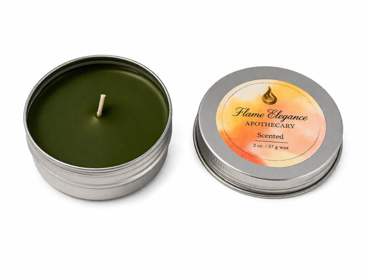 Scented candle in a metal tin with 'Flame Elegance Apothecary' label on a white background