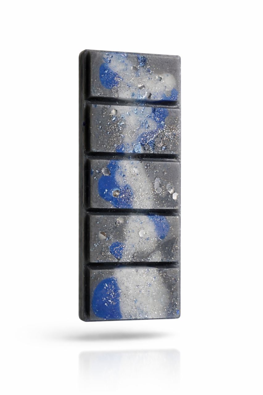 Mystical Waters ocean-inspired wax melt bar with blue and gray marbled wax design. 