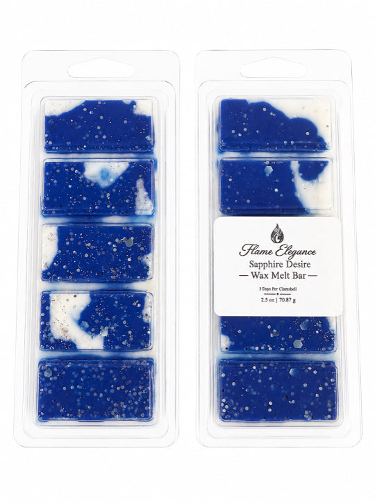 Two clear plastic clamshell packages of wax melt bars with blue and white marbled wax and silver glitter, labeled Flame Elegance Sapphire Desire.