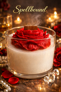 Spellbound scented candle with love spell fragrance. Contains natural wood wick and bright peony wax sculpted candle on top. Elegant petal background by Flame Elegance. 