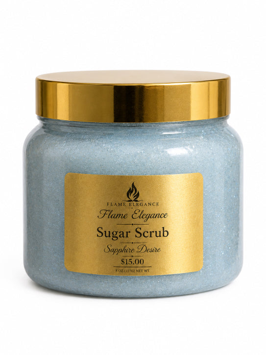 Jar of blue sapphire desire sugar scrub with gold lid and label on a white background by flame elegance