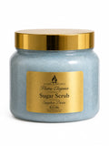 Jar of blue sapphire desire sugar scrub with gold lid and label on a white background by flame elegance