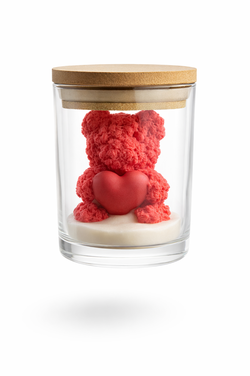 close up of soy wax teddy bear with bamboo lid and ivory wax base resemblin snow