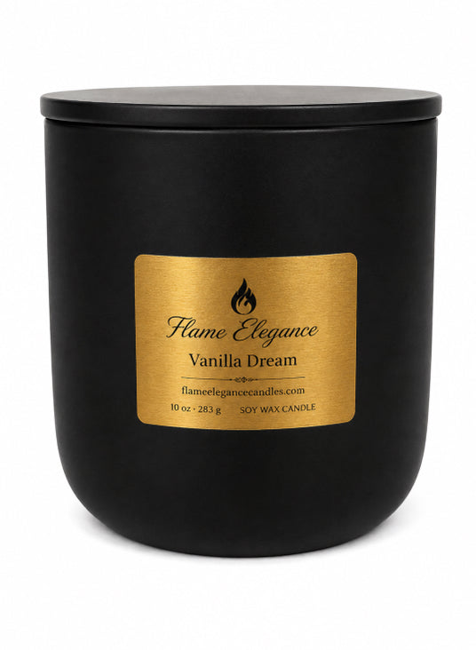 A matte black jar candle with a matching black lid and a gold label reading 'Flame Elegance Vanilla Dream' on a white background.