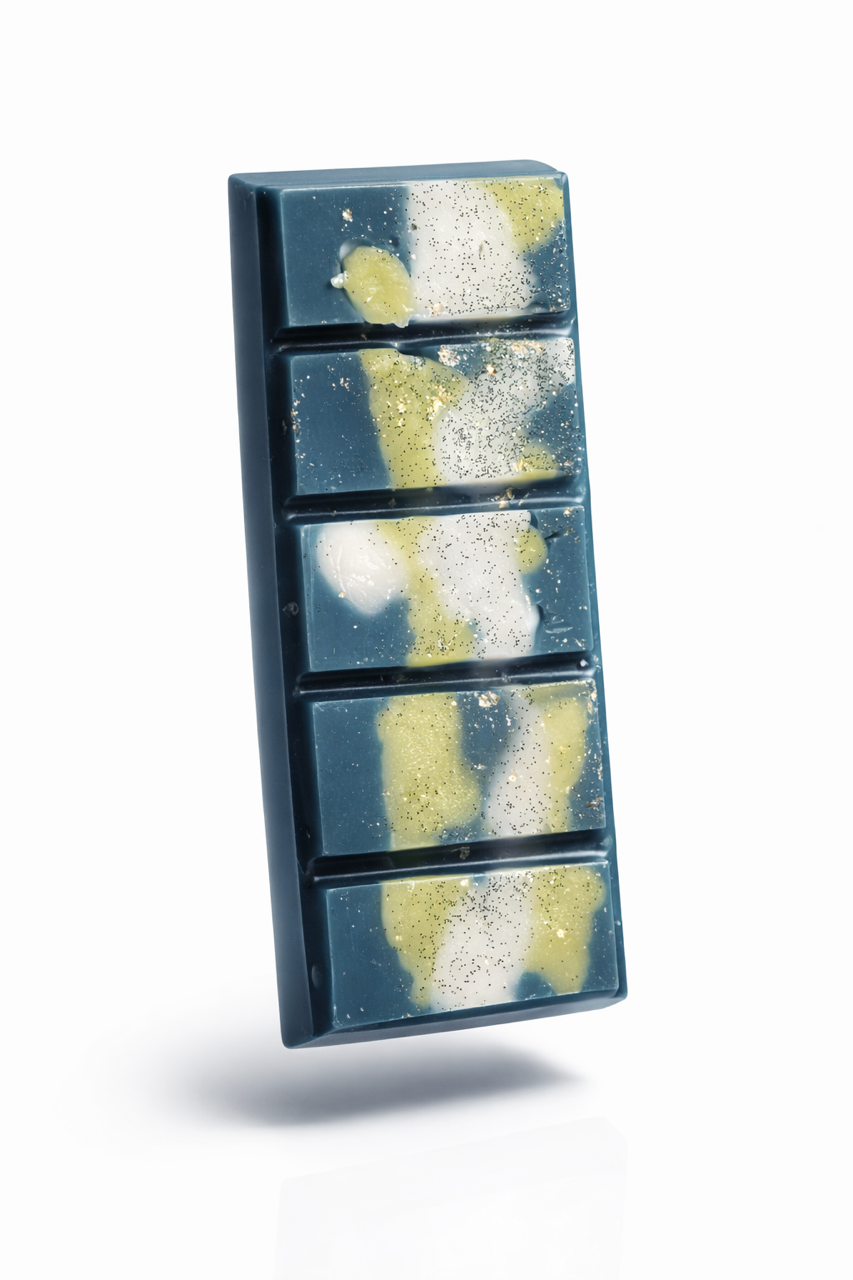 Up close product view of jasmine sea flower wax melt bar with gold shimmer. 