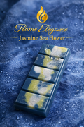 Jasmine Sea Flower wax melt bar with blue and cram marbling and gold shimmer on a coastal background. 