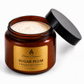 Brown jar of 'luxe Sugar Plum' whipped body butter with a black lid on a white background by Flame Elegance